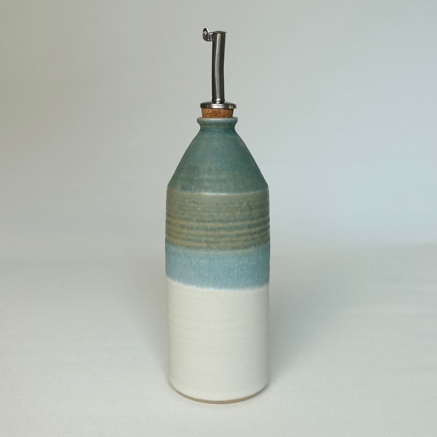 Bouteille d'huile en deux tons