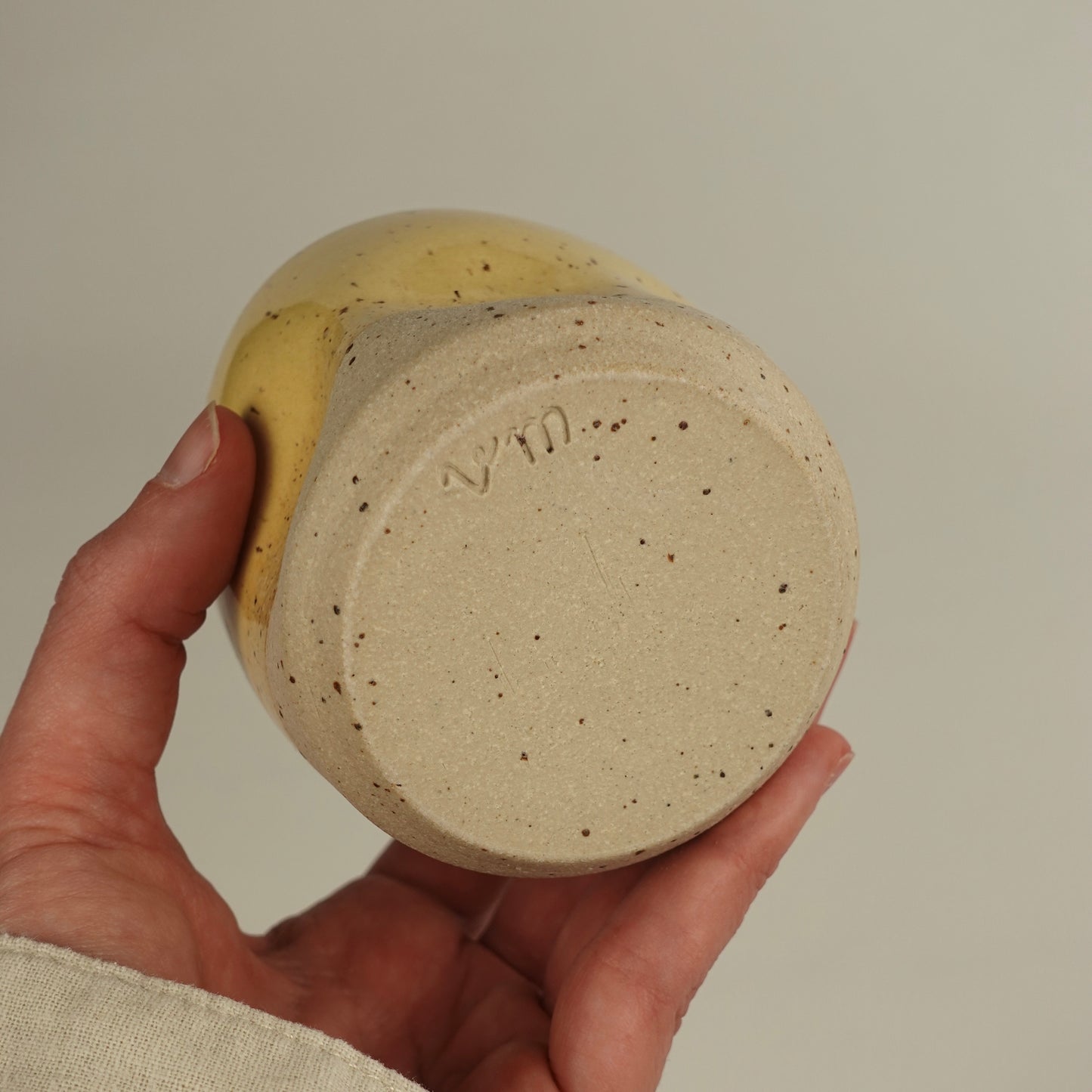 RIVAGE, yellow handleless cup