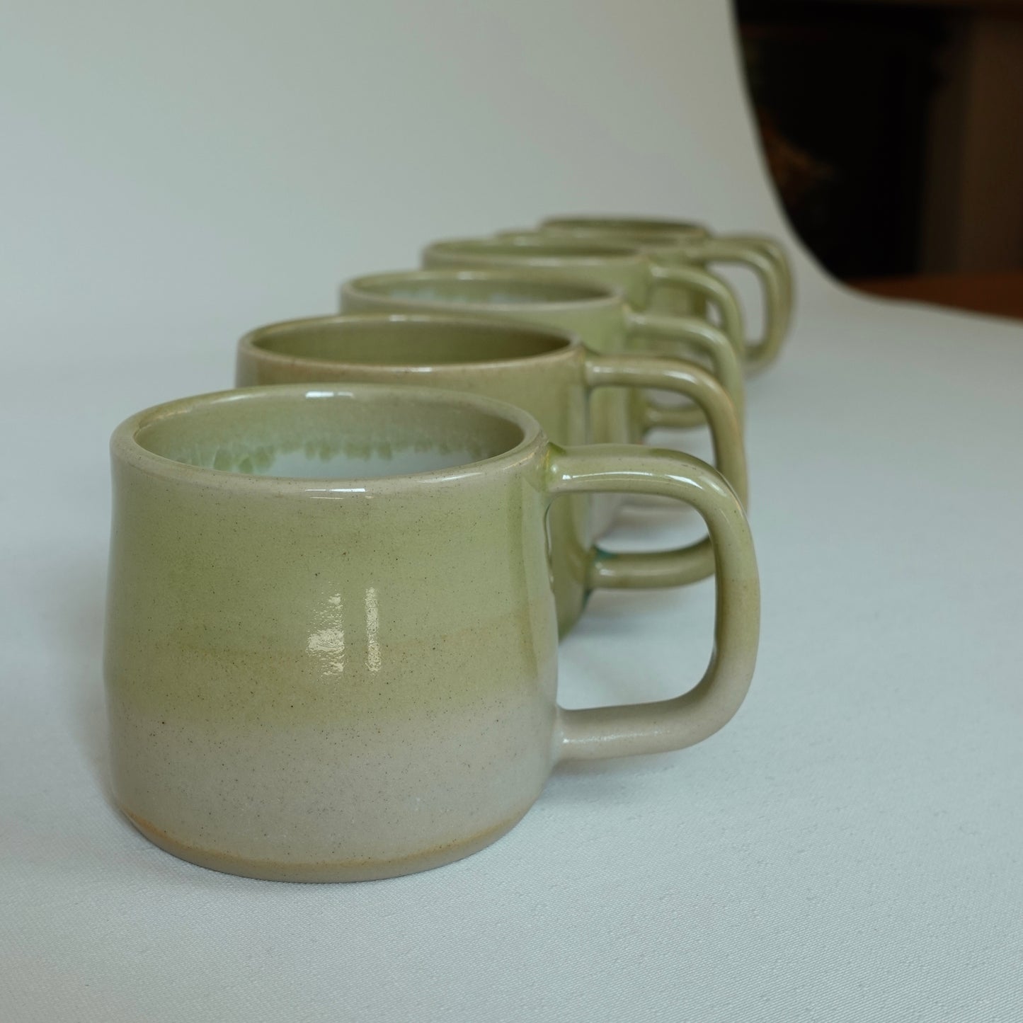 MIST, green coffee cup