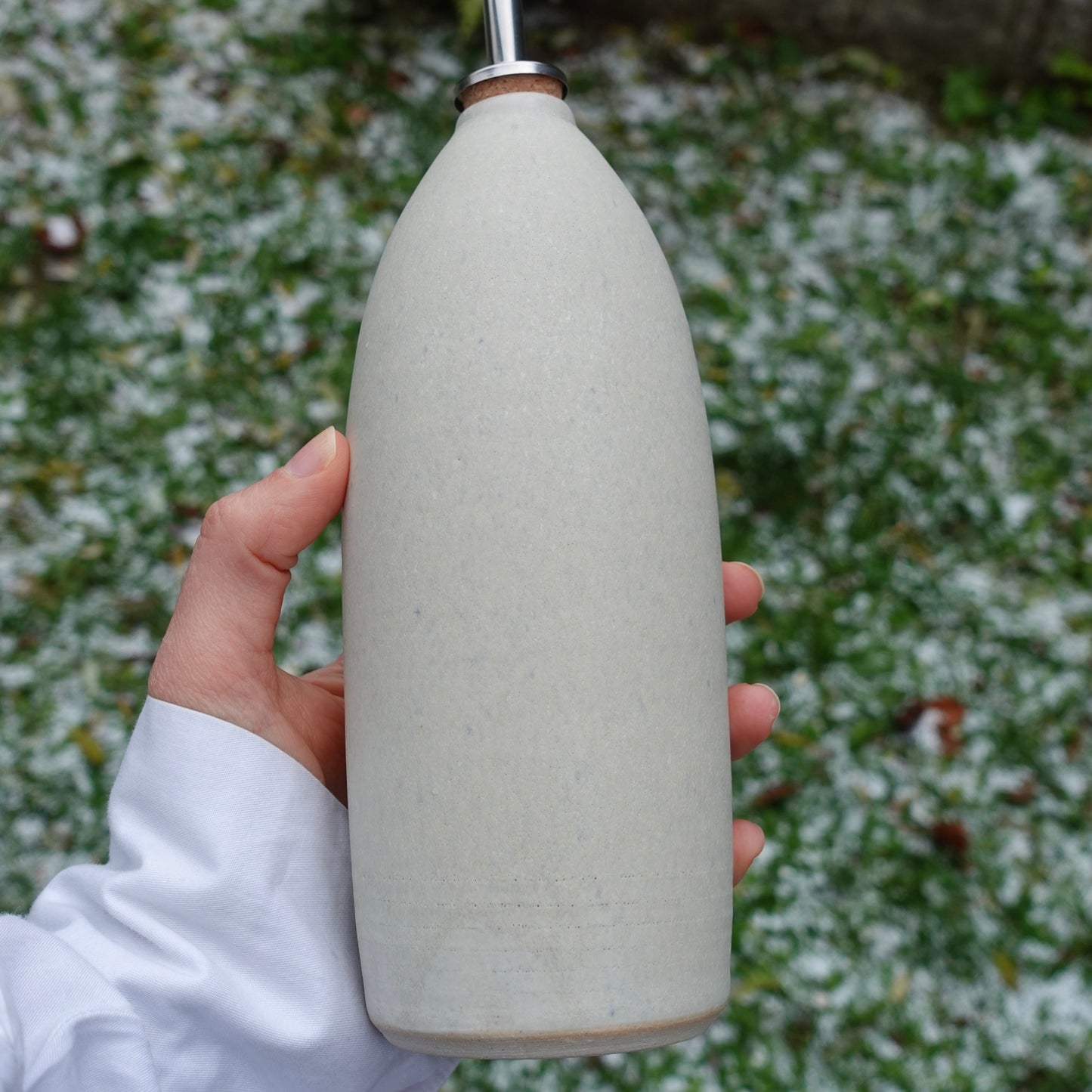 Bouteille d'huile beige