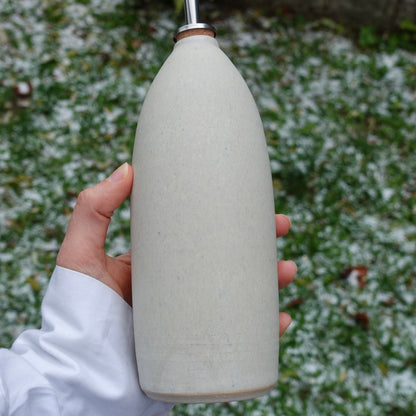 Bouteille d'huile beige