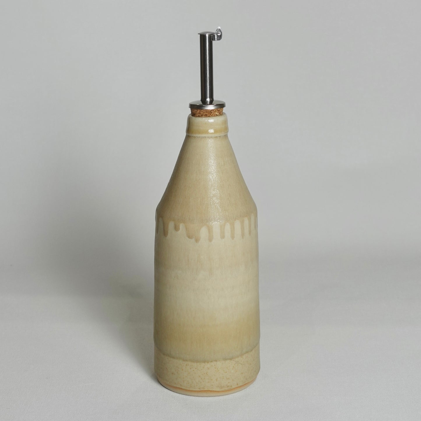 Bouteille d'huile beige