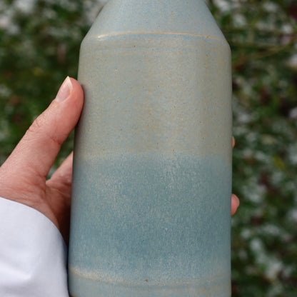 Bouteille d'huile bleue