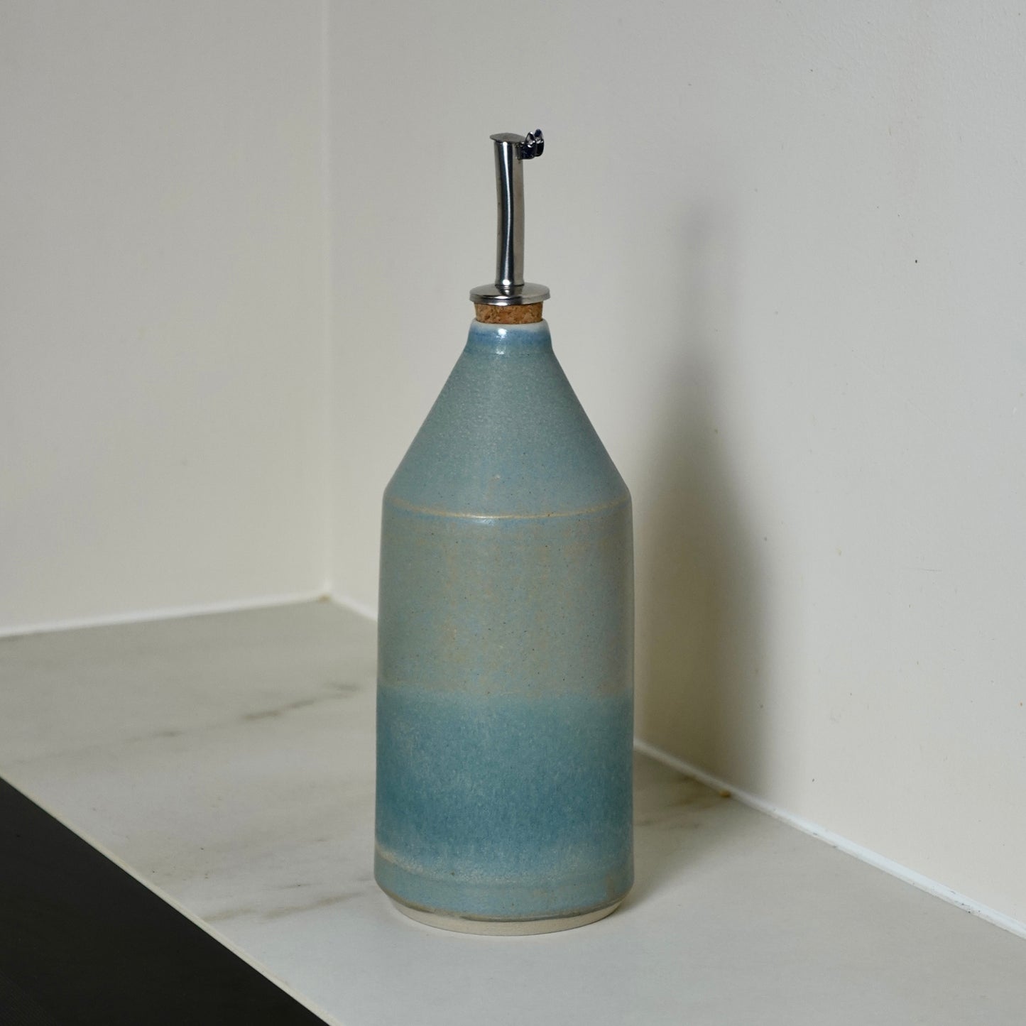 Bouteille d'huile bleue