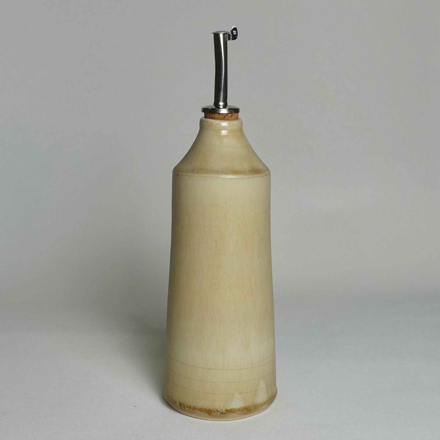 Bouteille d'huile beige