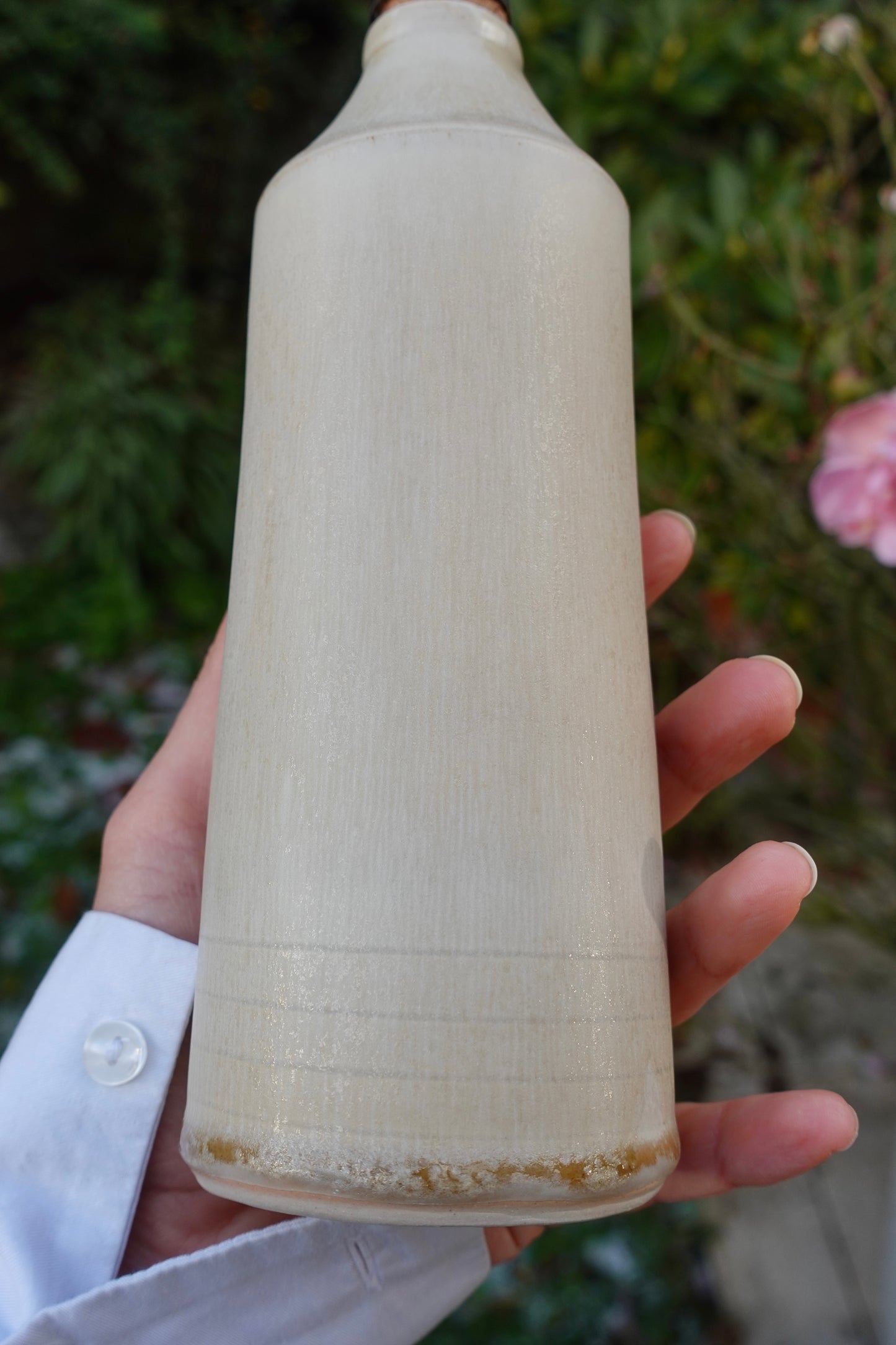 Bouteille d'huile beige