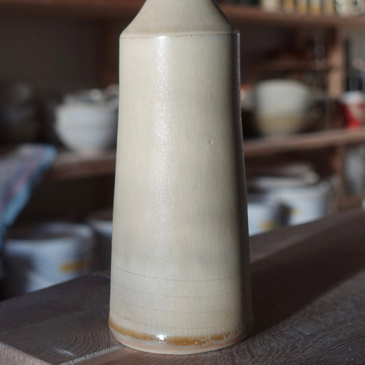 Bouteille d'huile beige