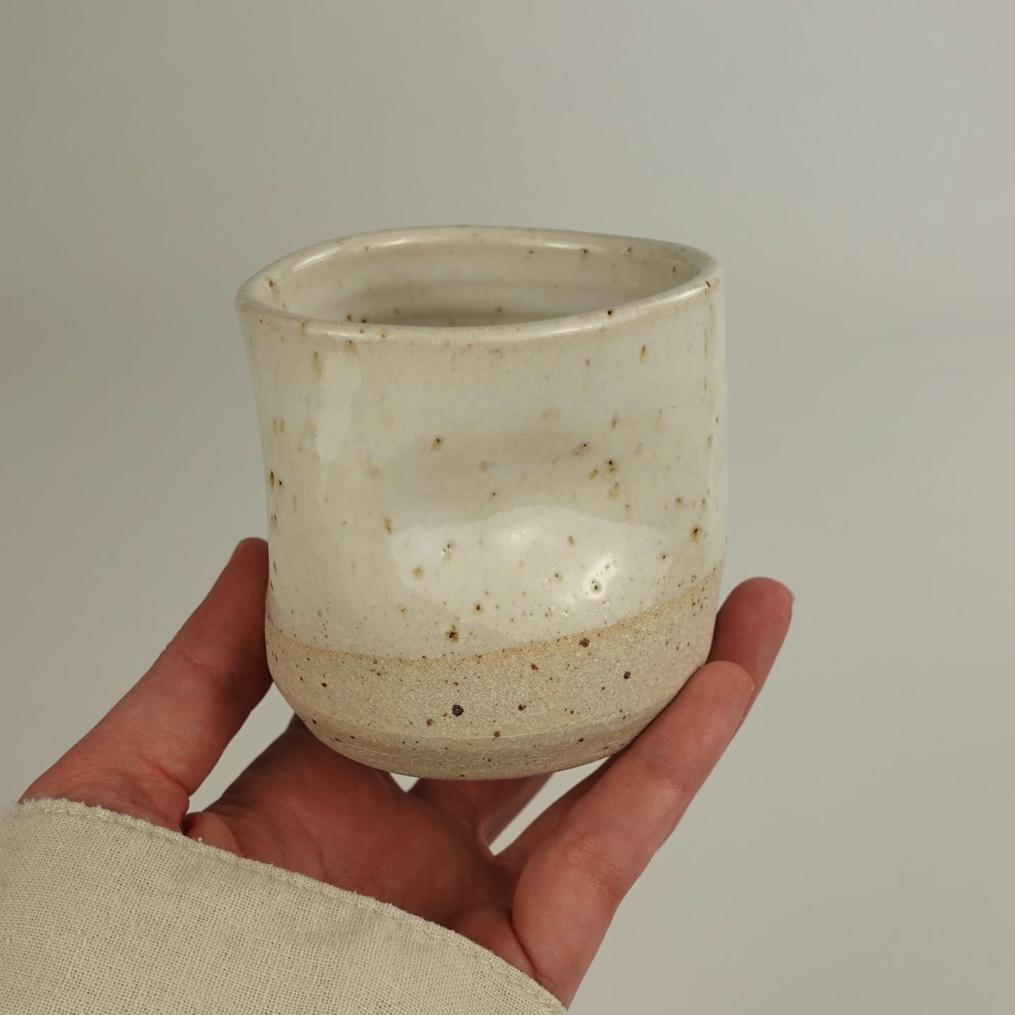 RIVAGE, yellow handleless cup