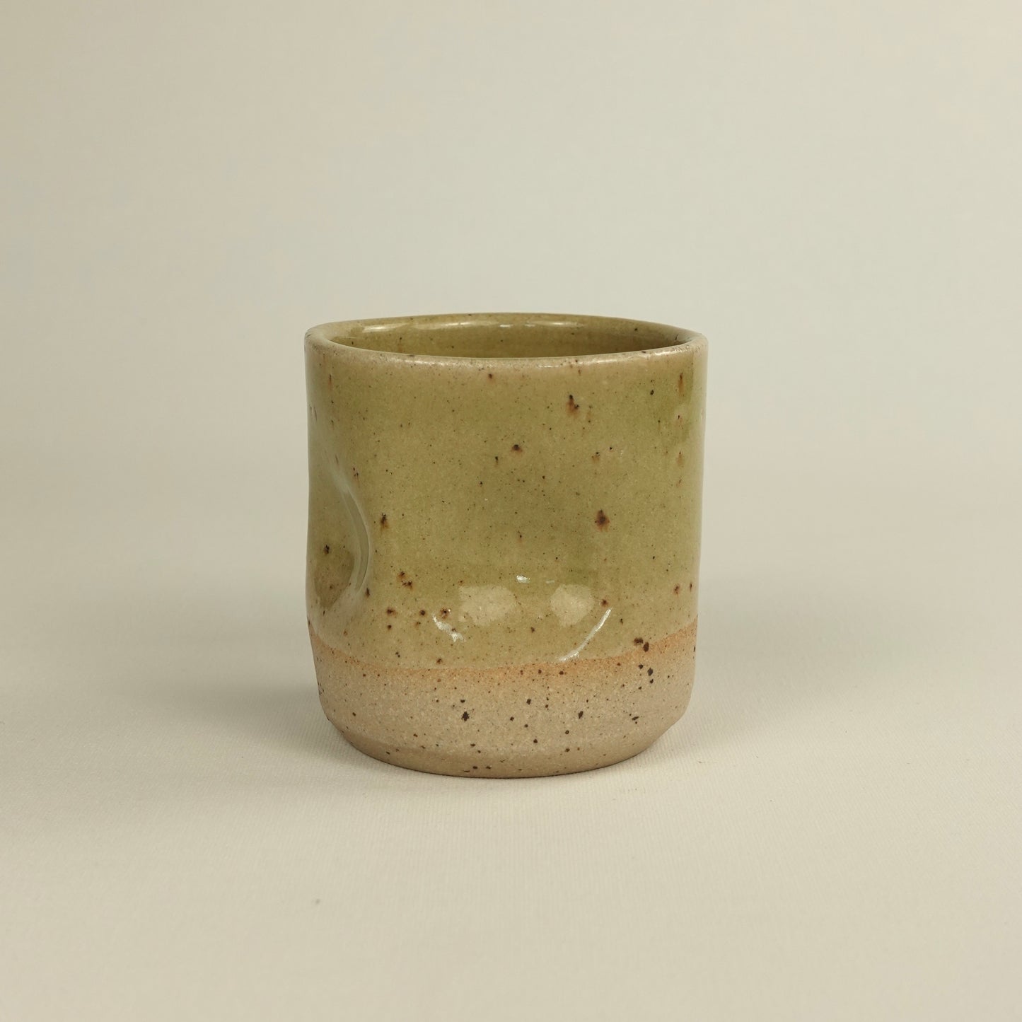 RIVAGE, yellow handleless cup