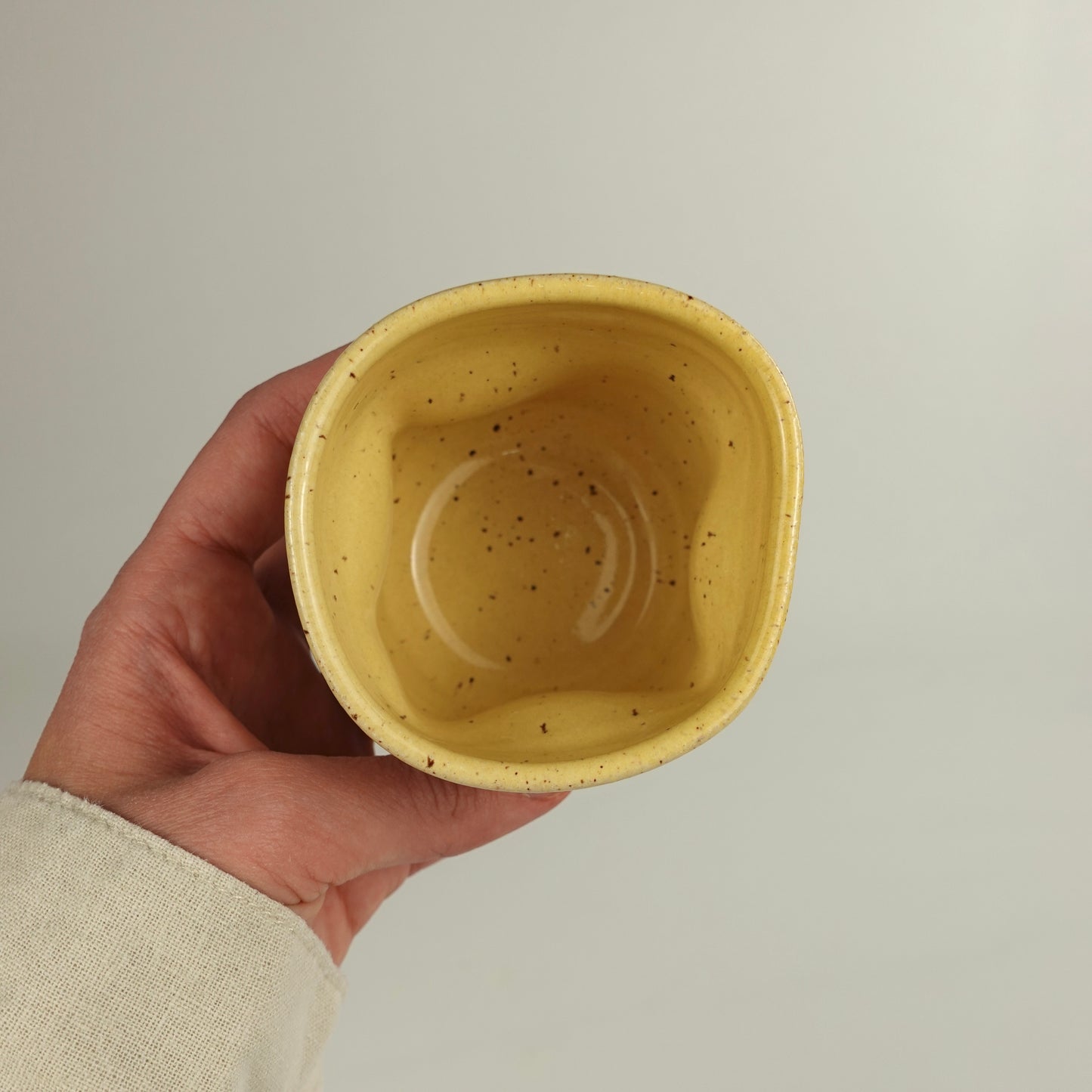 RIVAGE, yellow handleless cup