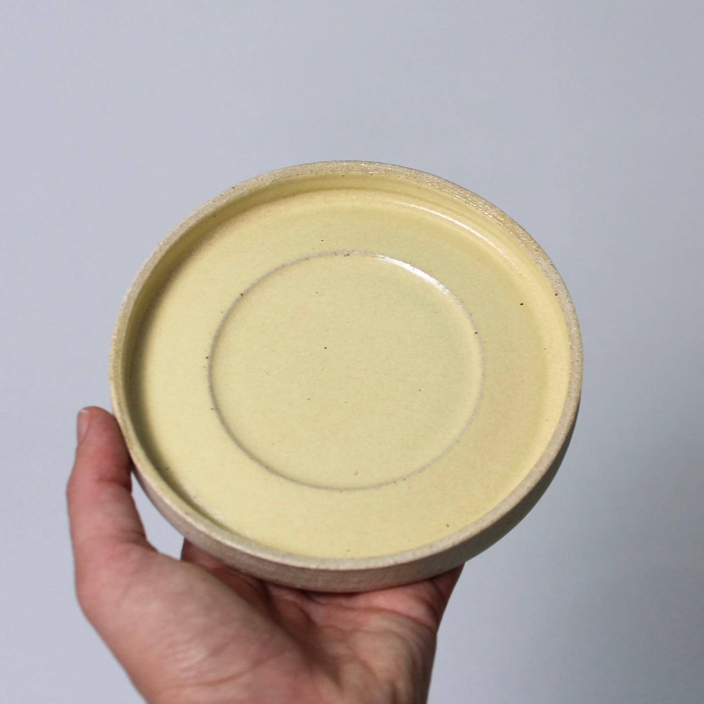 RIVAGE, yellow saucer