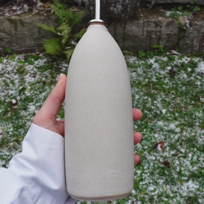 Bouteille d'huile beige